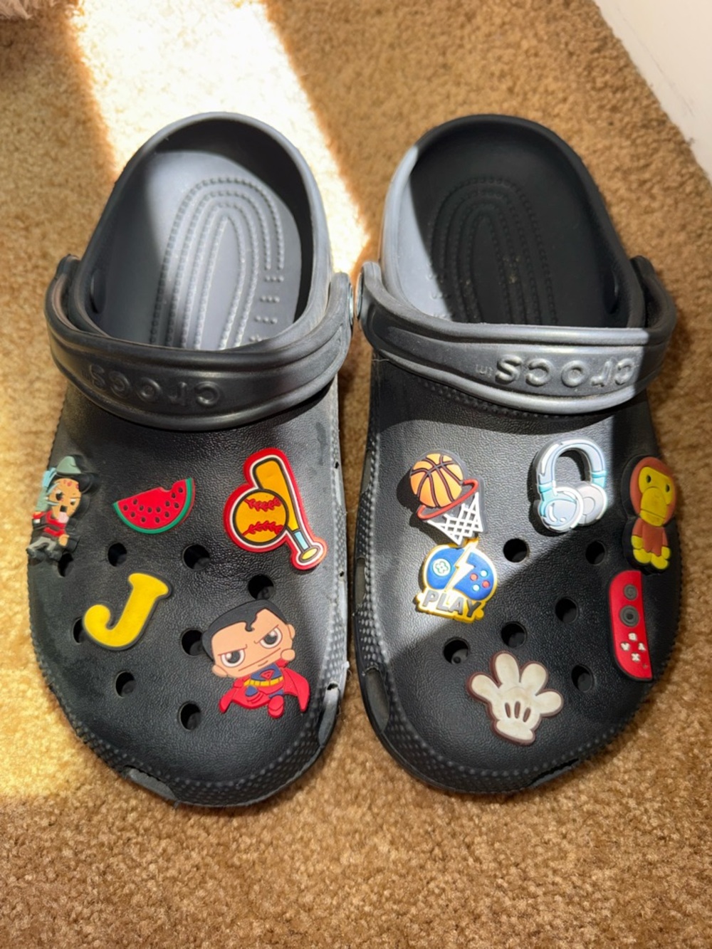 CROCS Kids Black Clogs with Colorful Charm Accents